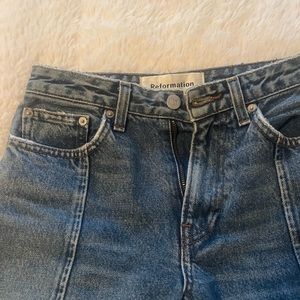Reformation straight leg jeans with hem down the middle